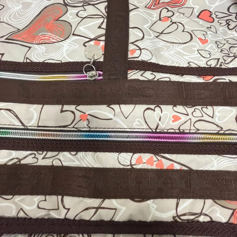 Le Sportsac computer messenger bag 11 x 15 hearts pink brown shoulder strap